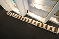 Lot 73 - EXTERIOR MOUNTED MANUAL WIND-OUT BLIND IN BROWN / PINK STRIPE, LINED WIDTH APPROX. 2.84M (VAT applicable)