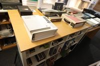 Lot 83 - 59INCH TIMBER FRAMED BEECH TOP SERVING COUNTER & CONTENTS OF SAMPLES ON TOP OF COUNTER, & IN PIGEON HOLES BEHIND COUNTER (VAT applicable)