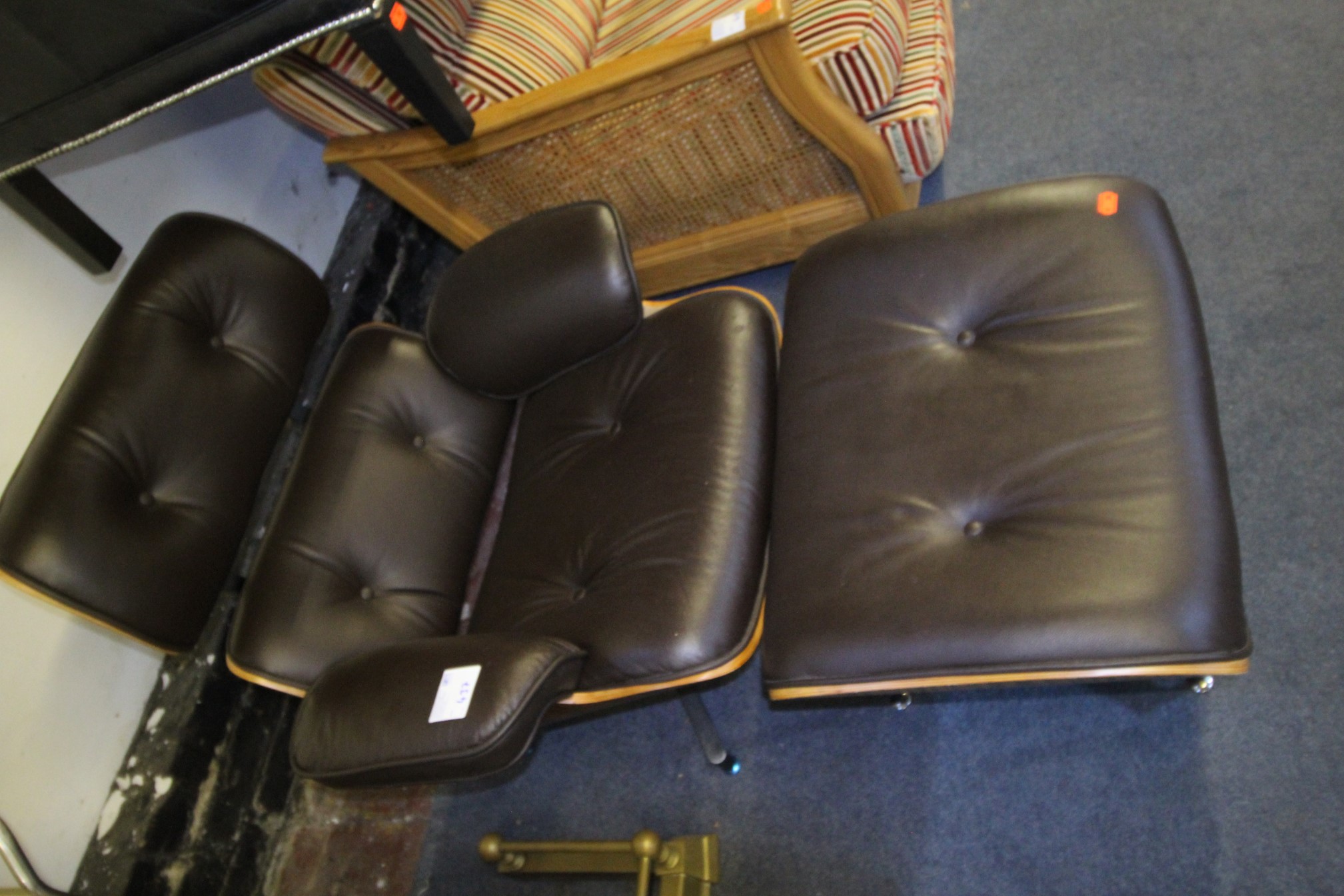Lot 437 - Swivel Armchair and Footstool - £325