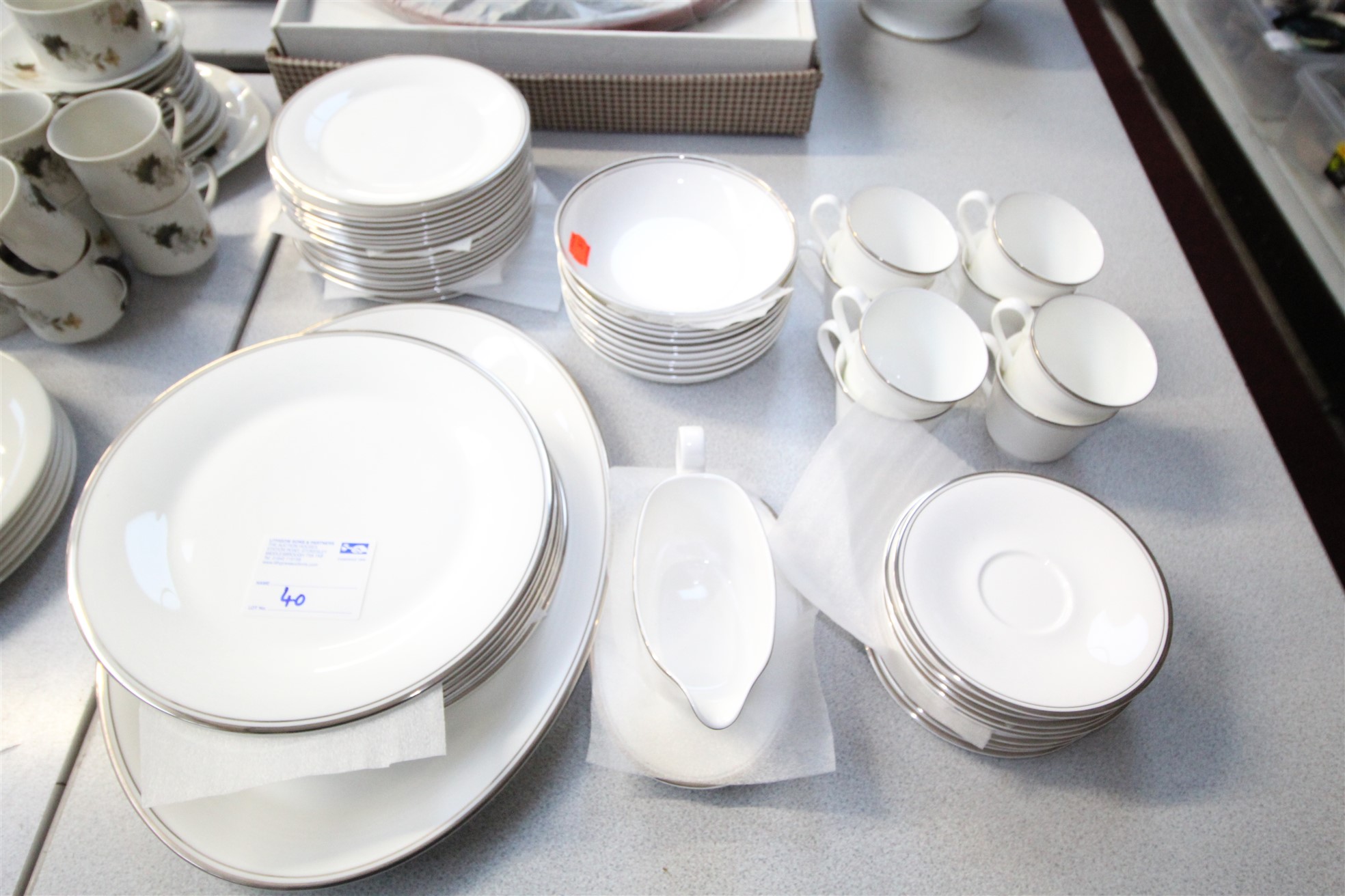 Lot 40 - Part Royal Doulton Dinner Service - £75