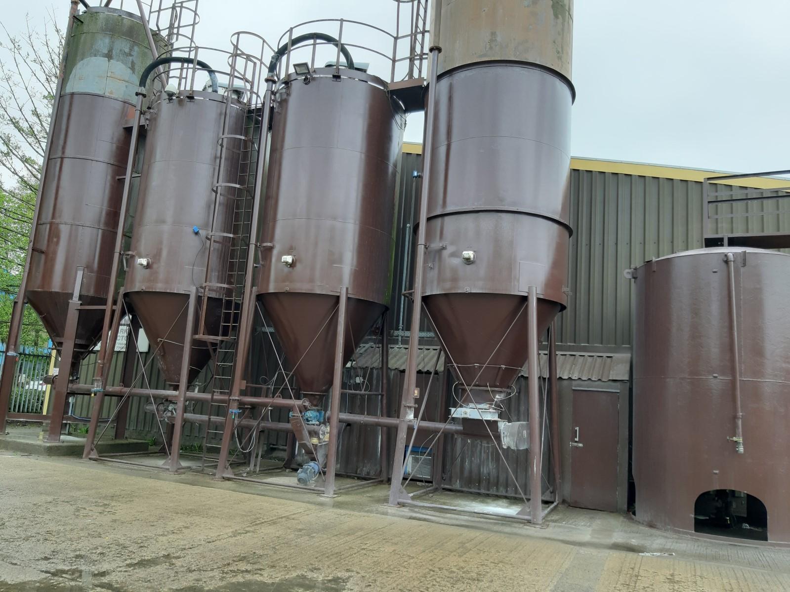 Industrial storage silos valued as part of an ongoing process/manufacturing business.